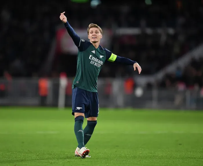 Framed Print : Martin Odegaard Faces PSV Eindhoven with Arsenal in Champions League Group B (2023-24)