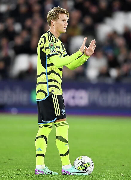 Martin Odegaard Reacts During Intense West Ham United vs Arsenal Carabao Cup Clash, 2023-24