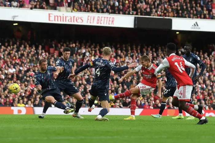 Framed Print : Martin Odegaard Scores Fifth Goal: Arsenal FC Dominates Nottingham Forest in Premier League (2022-23) Framed Print : Martin Odegaard Scores Fifth Goal: Arsenal FC Dominates Nottingham Forest in Premier League (2022-23)