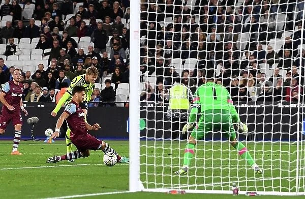 Martin Odegaard Scores First Arsenal Goal: Arsenal Advances in Carabao Cup against West Ham United