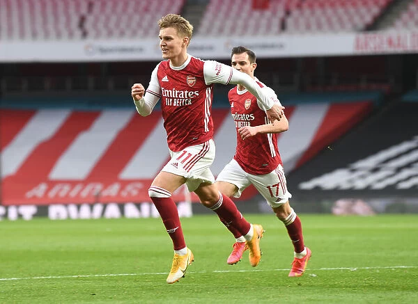 Martin Odegaard Scores Historic First Arsenal Goal Against Tottenham in Empty Emirates Stadium