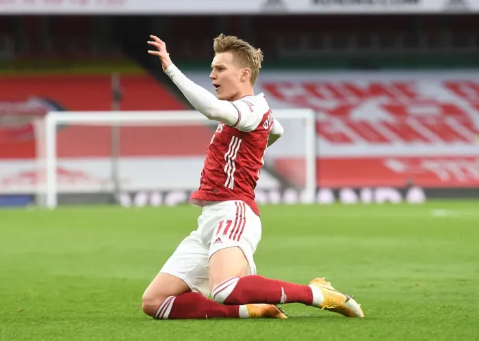 Framed Print : Martin Odegaard Scores Historic First Goal for Arsenal Against Tottenham in Empty Emirates Stadium