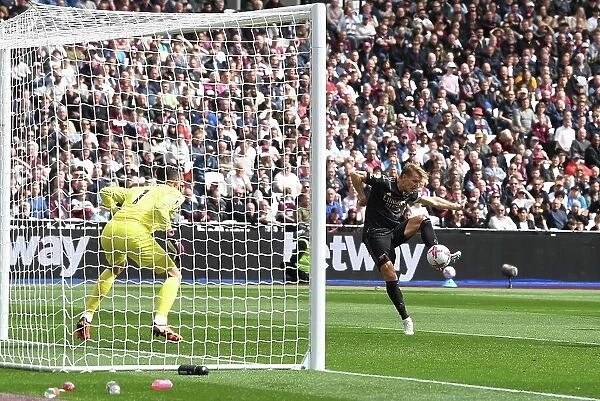 Martin Odegaard Scores the Second: West Ham United vs. Arsenal FC, Premier League 2022-23