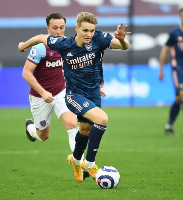 Framed Print : Martin Odegaard Scores the Thriller: Arsenal's Victory at Empty West Ham Stadium, Premier League 2020-21