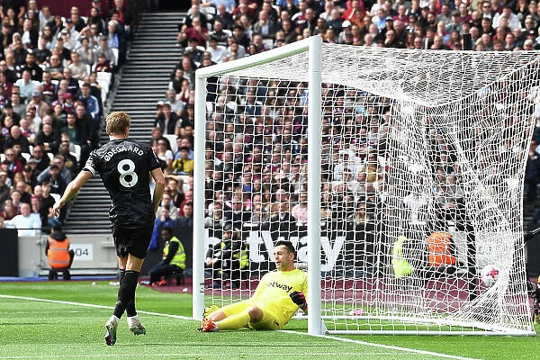 Martin Odegaard Scores Thrilling Second Goal: Arsenal's Victory at London Stadium vs. West Ham United (April 2023)