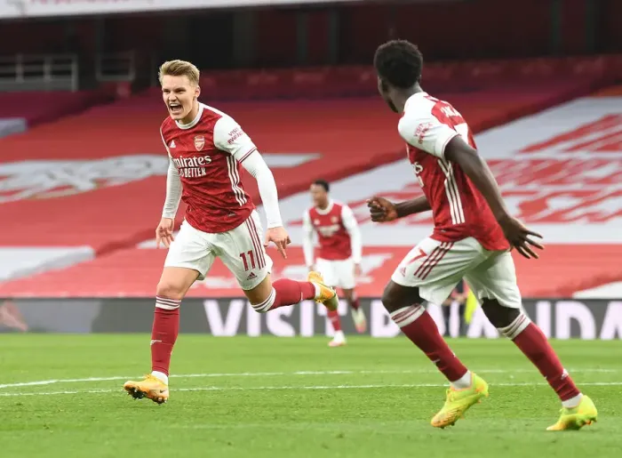 Framed Print : Martin Odegaard Scores Thrilling Winner: Arsenal Edges Past Tottenham in Empty Emirates Stadium