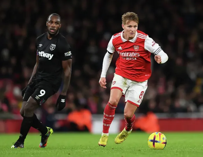 Framed Print : Martin Odegaard Shines: Arsenal's Holiday Triumph Over West Ham United