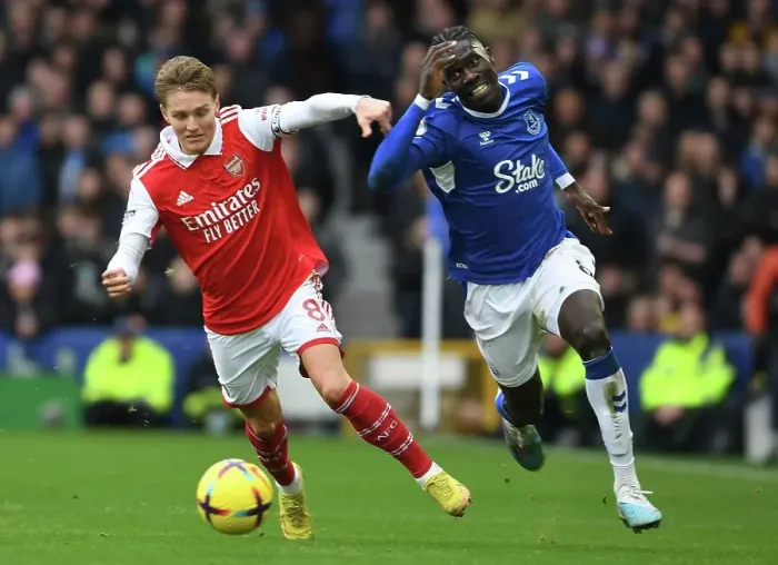 Framed Print : Martin Odegaard vs. Amadou Onana: A Battle of Midfield Titans in the Premier League Framed Print : Martin Odegaard vs. Amadou Onana: A Battle of Midfield Titans in the Premier League