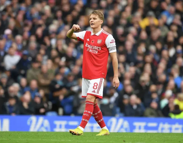 Framed Print : Martin Odegaard vs Chelsea: Arsenal's Star Clashes in Premier League Battle (2022-23)