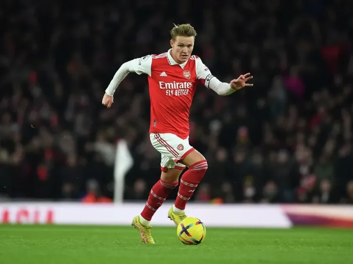 Framed Print : Martin Odegaard vs Manchester United: Arsenal's Midfield Showdown (2022-23)