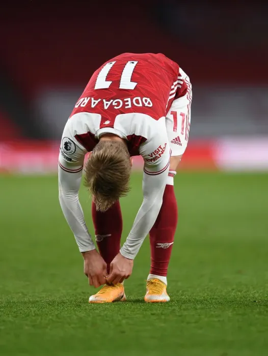 Framed Print : Martin Odegaard vs. Tottenham: A Riveting Clash in the Premier League