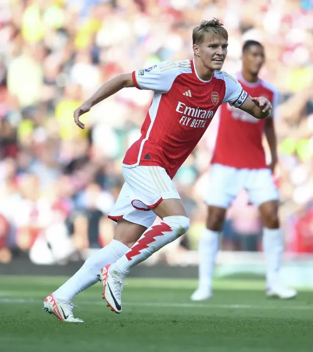 Framed Print : Martin Odegaard's Brilliant Performance: Arsenal's Thrilling Victory Over Manchester United in the 2023-24 Premier League Framed Print : Martin Odegaard's Brilliant Performance: Arsenal's Thrilling Victory Over Manchester United in the 2023-24 Premier League