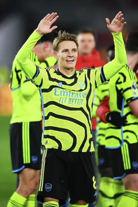 Framed Print : Martin Odegaard's Celebration: Arsenal Secures Victory Over Brentford in 2023-24 Premier League