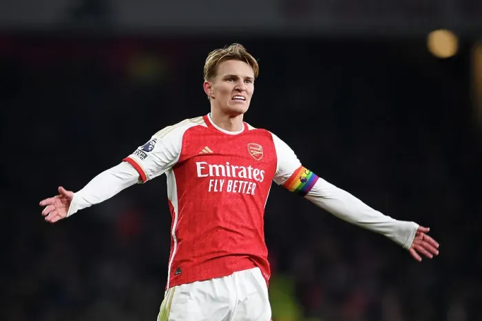 Framed Print : Martin Odegaard's Emotional Moment: Arsenal's Struggle Against Wolverhampton Wanderers (2023-24)