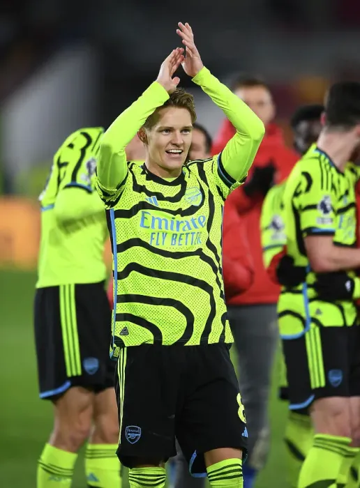 Framed Print : Martin Odegaard's Euphoric Moment: Arsenal Secures Triumph Over Brentford in 2023-24 Premier League Framed Print : Martin Odegaard's Euphoric Moment: Arsenal Secures Triumph Over Brentford in 2023-24 Premier League