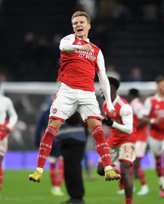Framed Print : Martin Odegaard's Goal: Arsenal Celebrates Premier League Victory Over Tottenham Hotspur