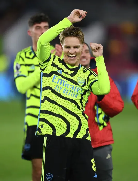 Framed Print : Martin Odegaard's Goal Celebration: Arsenal Secures Victory Over Brentford in 2023-24 Premier League