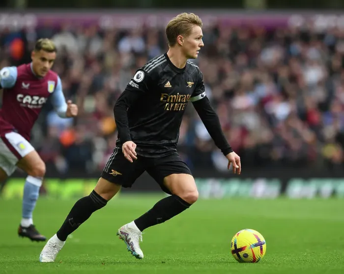 Framed Print : Martin Odegaard's Midfield Magic: Arsenal's Victory at Aston Villa, Premier League 2022-23