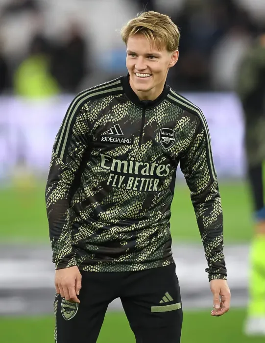 Framed Print : Martin Odegaard's Pre-Match Routine: Arsenal Star Readies for Carabao Cup Battle against West Ham United Framed Print : Martin Odegaard's Pre-Match Routine: Arsenal Star Readies for Carabao Cup Battle against West Ham United