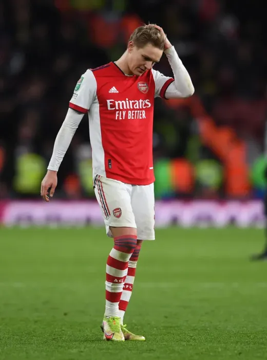 Framed Print : Martin Odegaard's Reaction: Arsenal vs Liverpool Carabao Cup Showdown