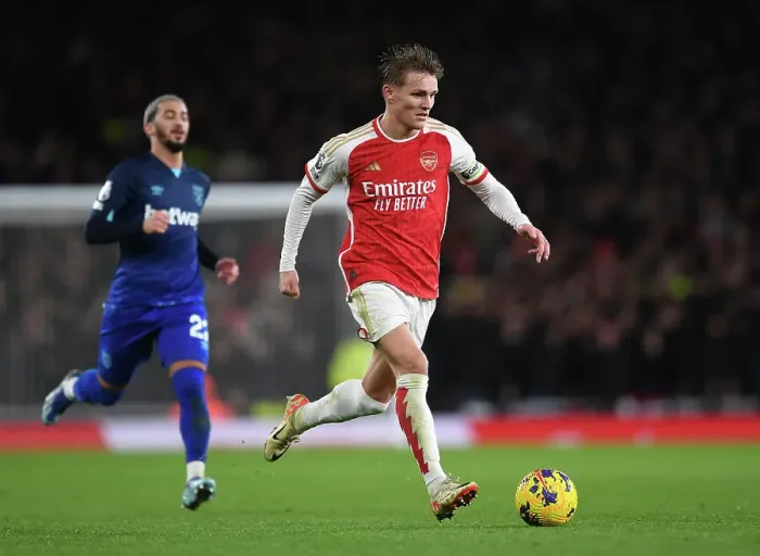 Framed Print : Martin Odegaard's Standout Display: Arsenal Triumphs Over West Ham United in Premier League Clash (2023-24) Framed Print : Martin Odegaard's Standout Display: Arsenal Triumphs Over West Ham United in Premier League Clash (2023-24)