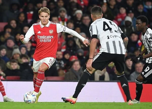 Martin Odegaard's Thrilling Performance: Arsenal vs Juventus Clash at Emirates Stadium (2022-23)