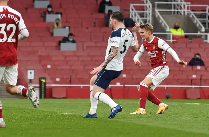 Framed Print : Martin Odegaard's Thrilling Winner: Arsenal Triumphs Over Tottenham in Epic Premier League Clash Framed Print : Martin Odegaard's Thrilling Winner: Arsenal Triumphs Over Tottenham in Epic Premier League Clash