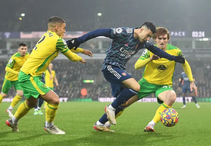 Framed Print : Martinelli Clashes with Norwich Defenders in Arsenal's Premier League Battle