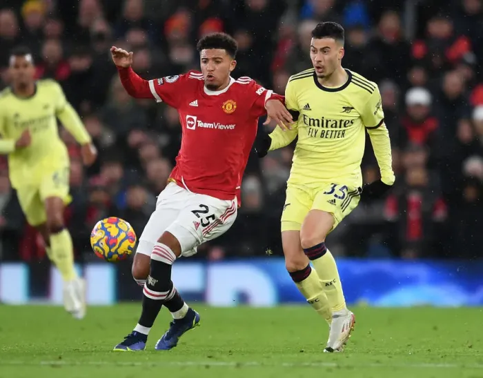 Framed Print : Martinelli Closes In: Intense Battle Between Manchester United's Sancho and Arsenal's Rising Star in Premier League Clash Framed Print : Martinelli Closes In: Intense Battle Between Manchester United's Sancho and Arsenal's Rising Star in Premier League Clash