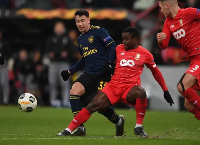 Framed Print : Martinelli Faces Pressure: Arsenal vs. Standard Liege, UEFA Europa League (December 2019)