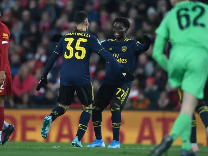 Framed Print : Martinelli and Saka's Stunning Goals: Arsenal's Carabao Cup Triumph over Liverpool