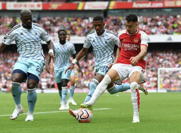 Framed Print : Martinelli Stands Firm Against Forest's Aurier and Danilo in Intense Arsenal-Forest Clash (2023-24 Premier League) Framed Print : Martinelli Stands Firm Against Forest's Aurier and Danilo in Intense Arsenal-Forest Clash (2023-24 Premier League)