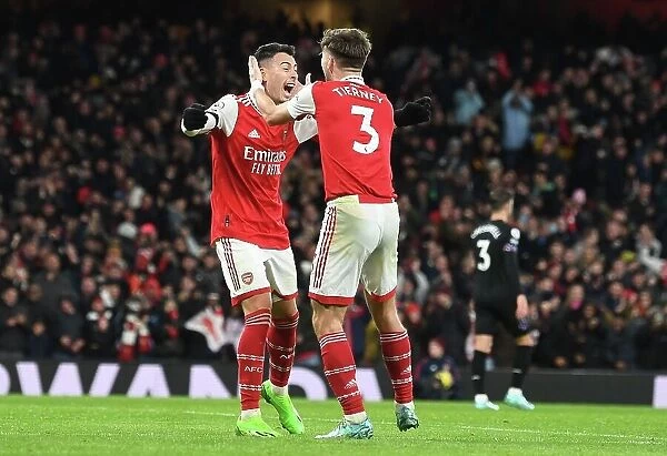 Martinelli and Tierney Celebrate Arsenal's Victory over West Ham United (2022-23)