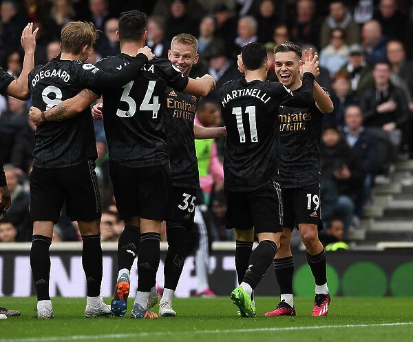 Martinelli and Trossard Celebrate Arsenal's Winning Goal Against Fulham (2022-23)