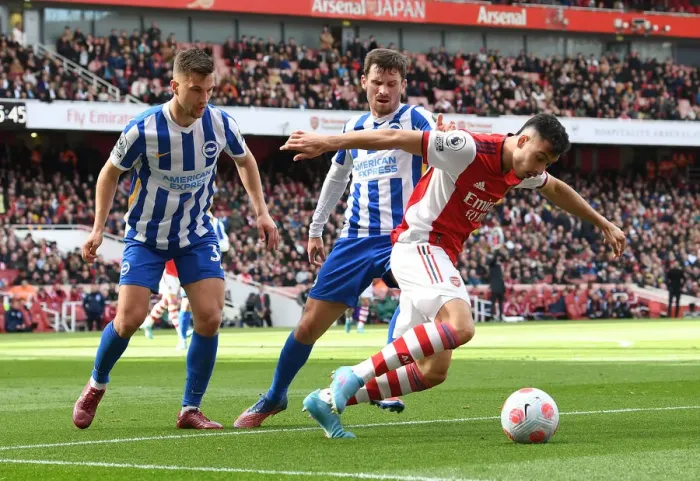Framed Print : Martinelli vs. Brighton: A Premier League Battle at Arsenal's Emirates Stadium