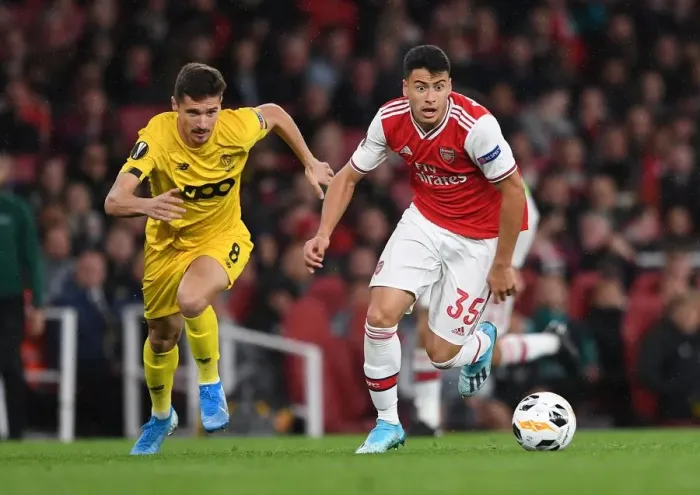 Framed Print : Martinelli vs. Cimirot: Intense Face-Off in Arsenal's Europa League Battle