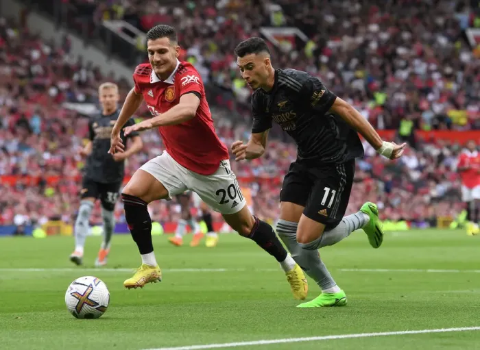 Framed Print : Martinelli vs Dalot: A Tense Battle in Manchester United vs Arsenal Premier League Clash (2022-23) Framed Print : Martinelli vs Dalot: A Tense Battle in Manchester United vs Arsenal Premier League Clash (2022-23)