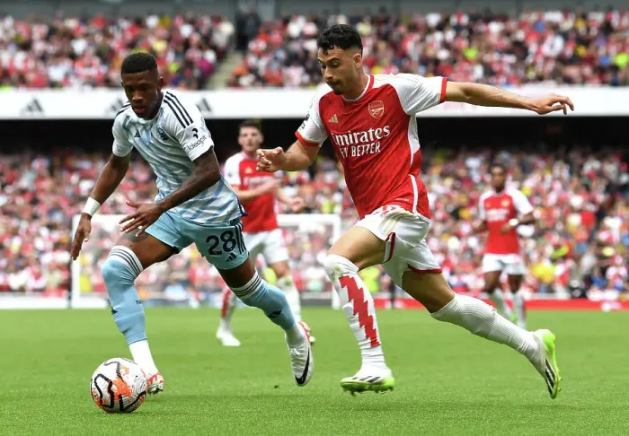 Framed Print : Martinelli vs. Danilo: Intense Battle in Arsenal's 2023-24 Premier League Opener