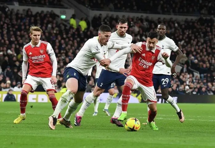 Framed Print : Martinelli vs Docherty: A Premier League Battle - Arsenal vs Tottenham (2022-23)