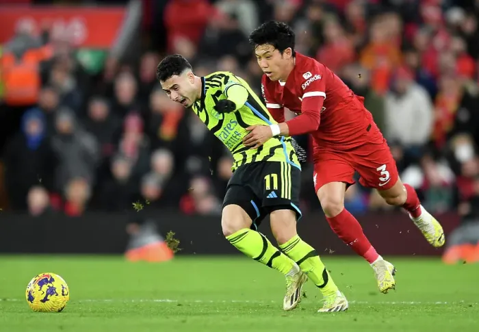Framed Print : Martinelli vs Endo: Intense Battle at Anfield - Liverpool vs Arsenal, Premier League 2023-24 Framed Print : Martinelli vs Endo: Intense Battle at Anfield - Liverpool vs Arsenal, Premier League 2023-24