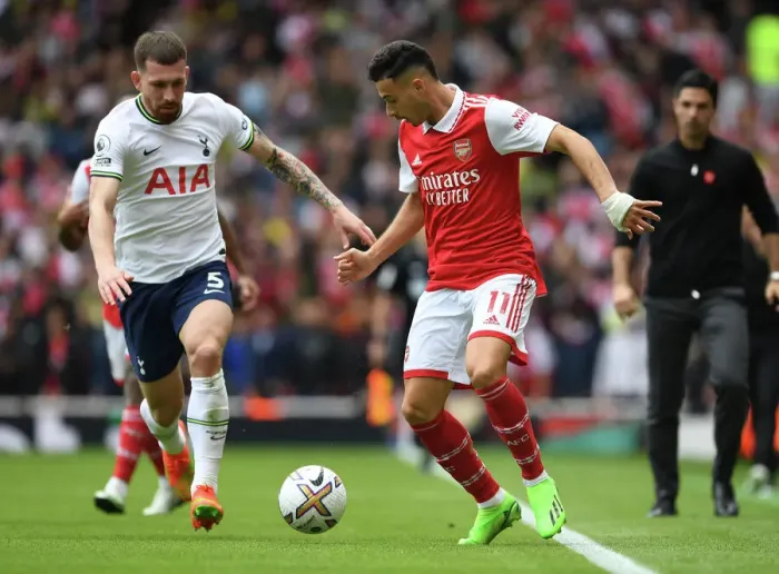 Framed Print : Martinelli vs. Hojbjerg: A Fiery Face-Off in the Arsenal-Tottenham Premier League Battle (2022-23)