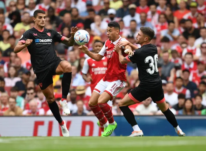 Framed Print : Martinelli vs Lamela & Jordán: Arsenal Star's Emirates Cup Showdown Against Sevilla