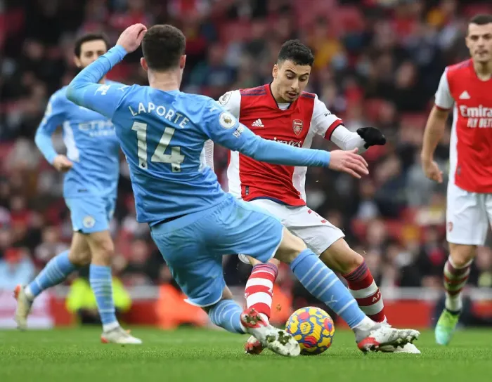 Framed Print : Martinelli vs Laporte: A Premier League Battle at Emirates Stadium - Arsenal vs Manchester City (2021-22) Framed Print : Martinelli vs Laporte: A Premier League Battle at Emirates Stadium - Arsenal vs Manchester City (2021-22)