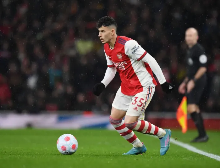 Framed Print : Martinelli vs Liverpool: Arsenal's Rising Star Clashes in Premier League Battle