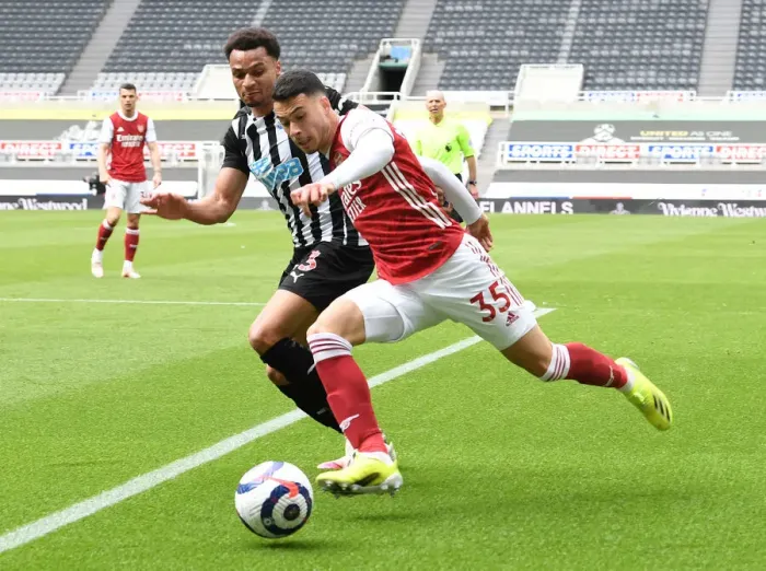 Framed Print : Martinelli vs Murphy: Arsenal's Battle at Empty St. James Park vs Newcastle United (Newcastle United v Arsenal 2021) Framed Print : Martinelli vs Murphy: Arsenal's Battle at Empty St. James Park vs Newcastle United (Newcastle United v Arsenal 2021)