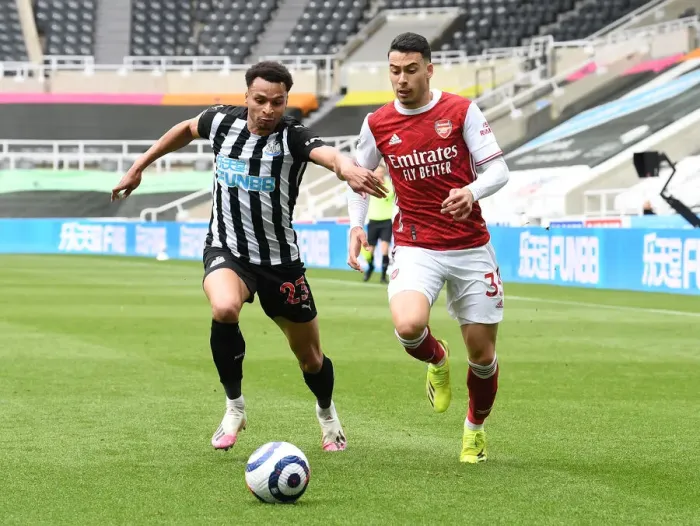 Framed Print : Martinelli vs Murphy: Battle at Empty St. James Park (Premier League 2021) Framed Print : Martinelli vs Murphy: Battle at Empty St. James Park (Premier League 2021)