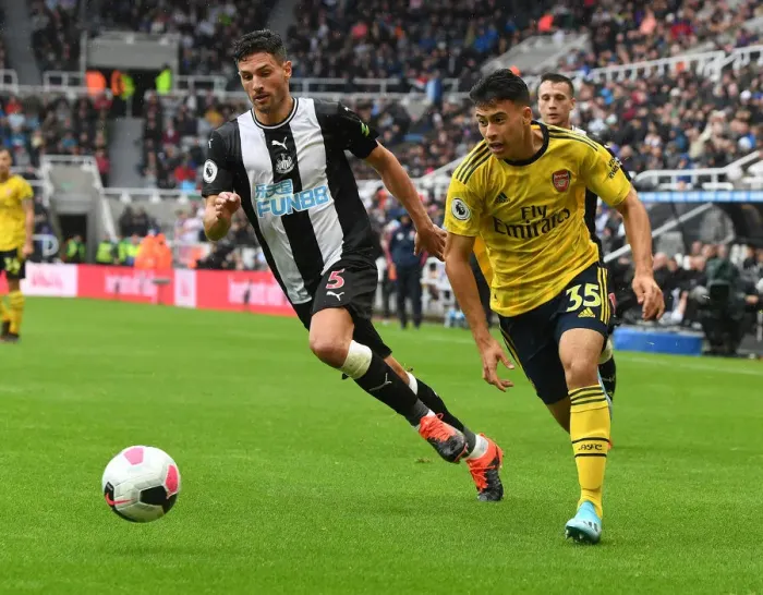 Framed Print : Martinelli vs Schar: Battle at St. James Park - Arsenal vs Newcastle, Premier League 2019-20 Framed Print : Martinelli vs Schar: Battle at St. James Park - Arsenal vs Newcastle, Premier League 2019-20