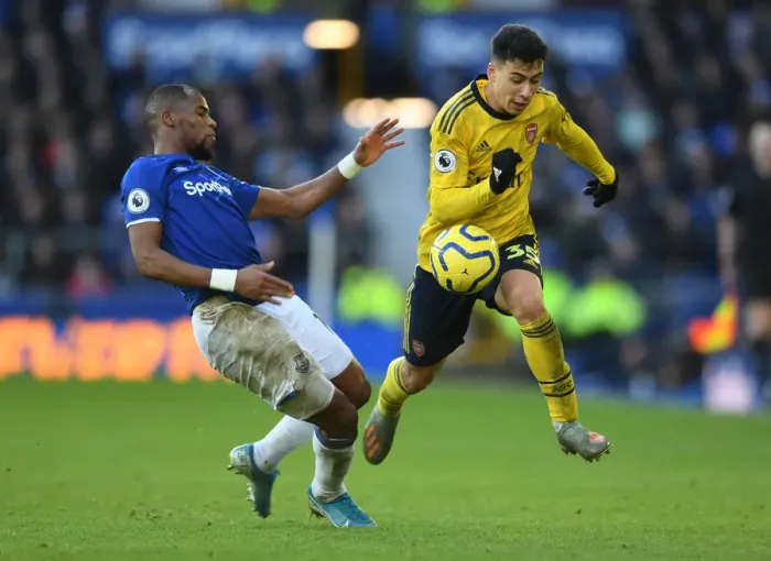 Framed Print : Martinelli vs Sidibe: Battle at Goodison Park - Everton vs Arsenal, Premier League 2019-20 Framed Print : Martinelli vs Sidibe: Battle at Goodison Park - Everton vs Arsenal, Premier League 2019-20
