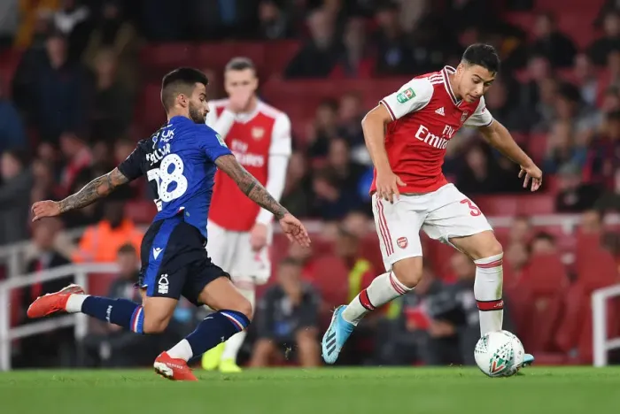 Framed Print : Martinelli vs. Silva: Arsenal's Carabao Cup Battle Against Nottingham Forest