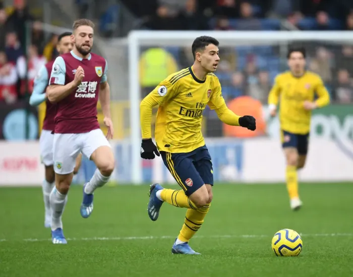 Framed Print : Martinelli vs Taylor: A Fiery Battle in Burnley vs Arsenal Premier League Clash